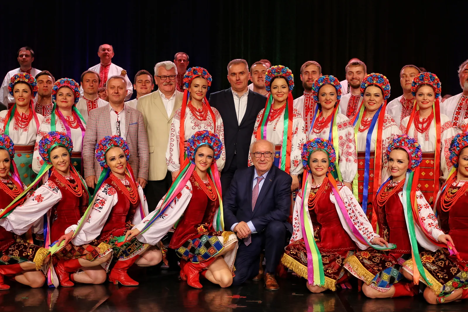 H. Veryovka Ukrainian National Honoured Academic Folk Choir photographed after a concert in Ożarów Mazowiecki, Poland (2018) — ensemble in traditional Ukrainian vyshyvanky and flower wreaths representing the choral folk performance tradition from which UNESCO's inscription of the Cossack's songs of Dnipropetrovsk Region (File 01194) draws its context