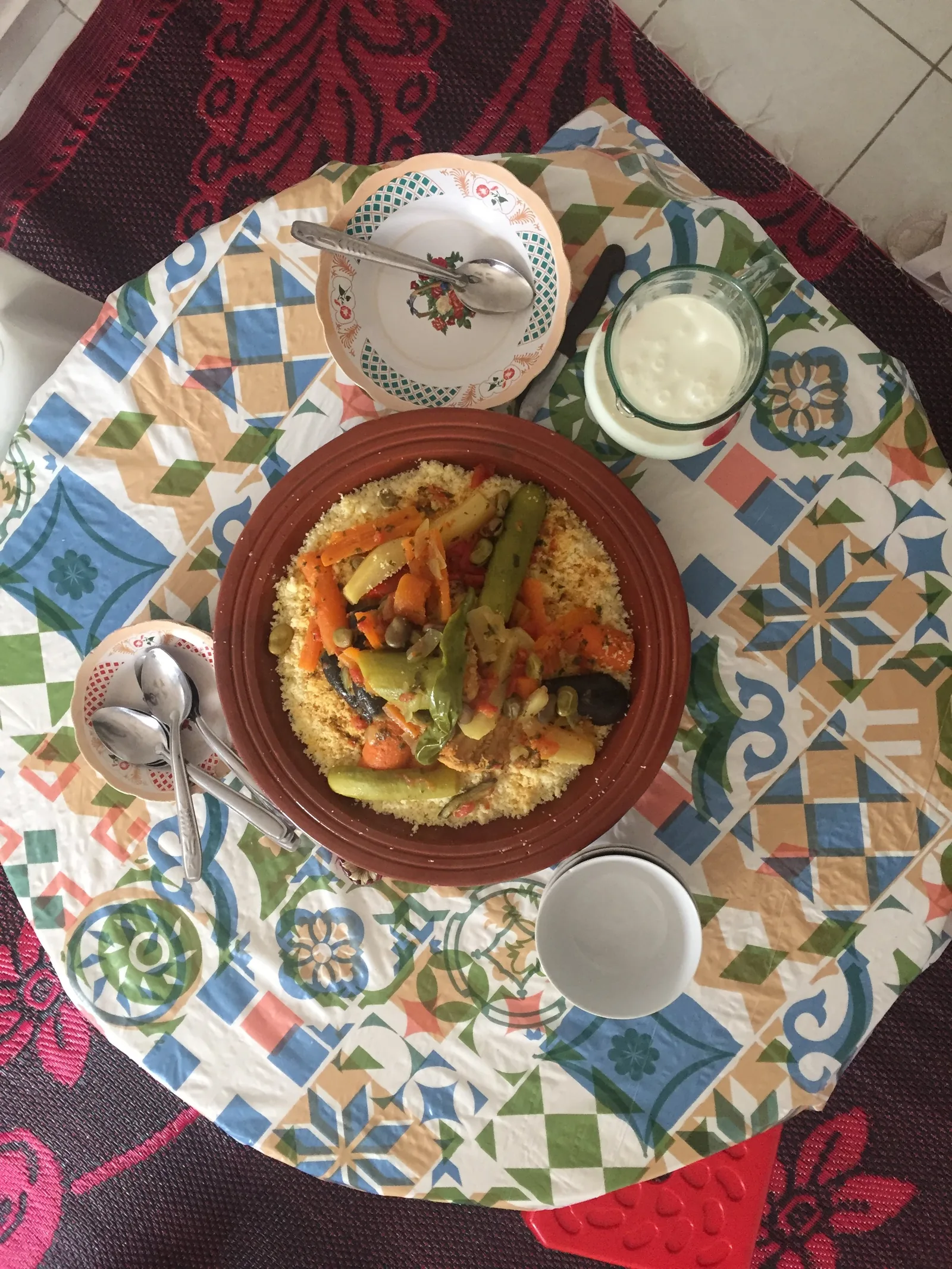 Traditional Friday couscous table in Morocco (2018) — communal couscous meal representing the social function of the dish as a symbol of solidarity and togetherness recognized in UNESCO's inscription of knowledge, know-how and practices pertaining to couscous (File 01602, December 2020, Algeria, Mauritania, Morocco, Tunisia)