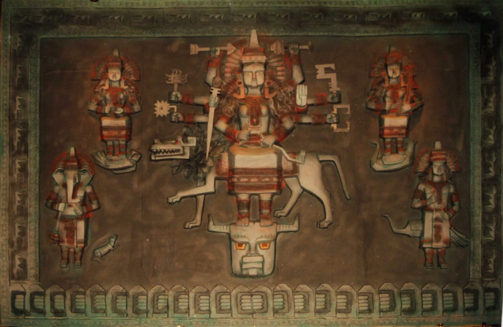 Creative artistic relief depicting the goddess Durga with 10 arms riding her lion and defeating Mahishasura, flanked by the four deities, in a distinctive non-traditional style from a Kolkata Durga Puja pandal — exemplifying the commissioned contemporary art tradition recognized in UNESCO's 2021 inscription