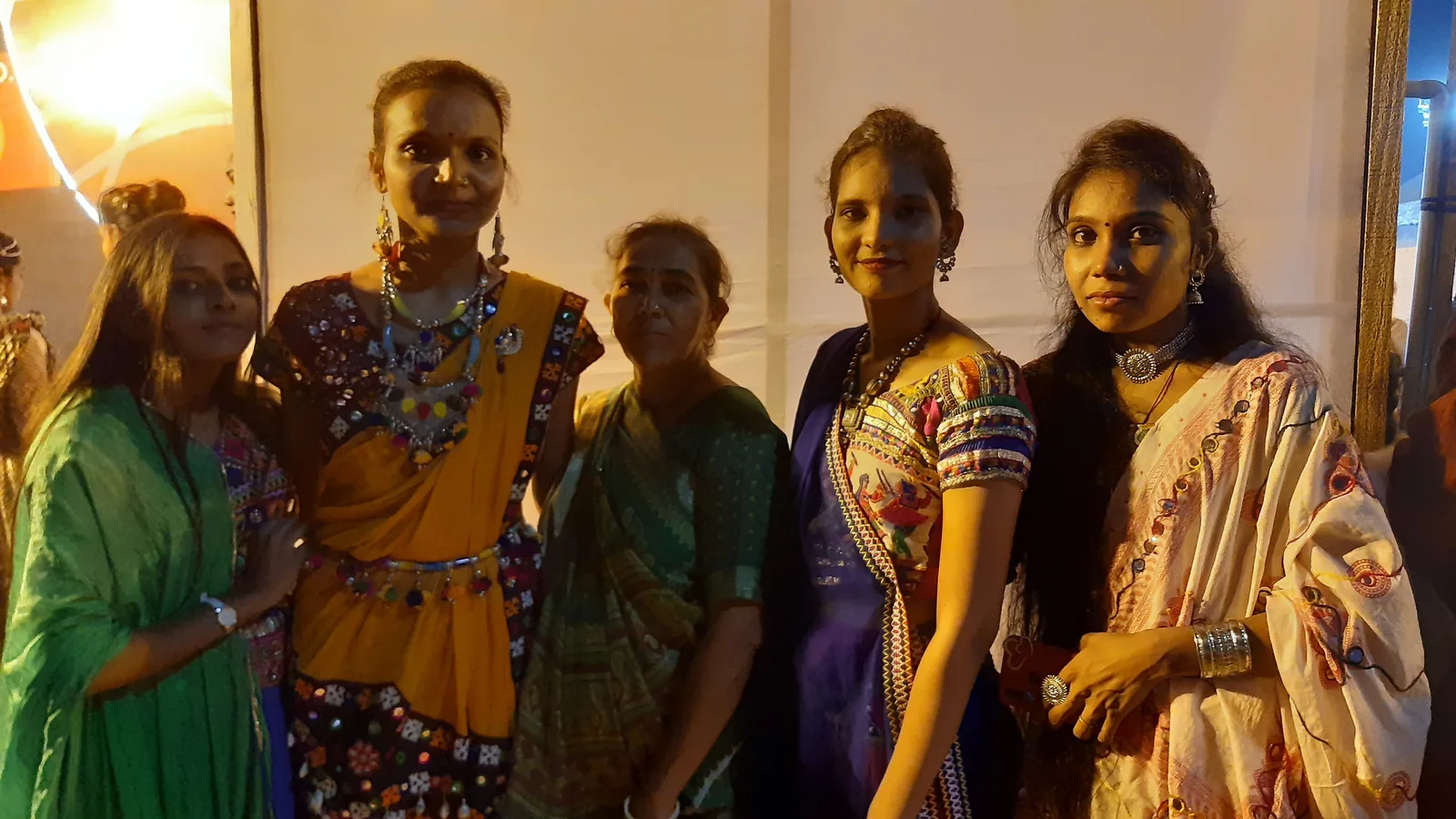 Women in traditional chaniya choli (embroidered skirts) at the Navratri garba celebration at GMDC ground, Ahmedabad, Gujarat 2022 — UNESCO's 2023 inscription covers the communities of practitioners including the dancers who perform garba annually during Navratri