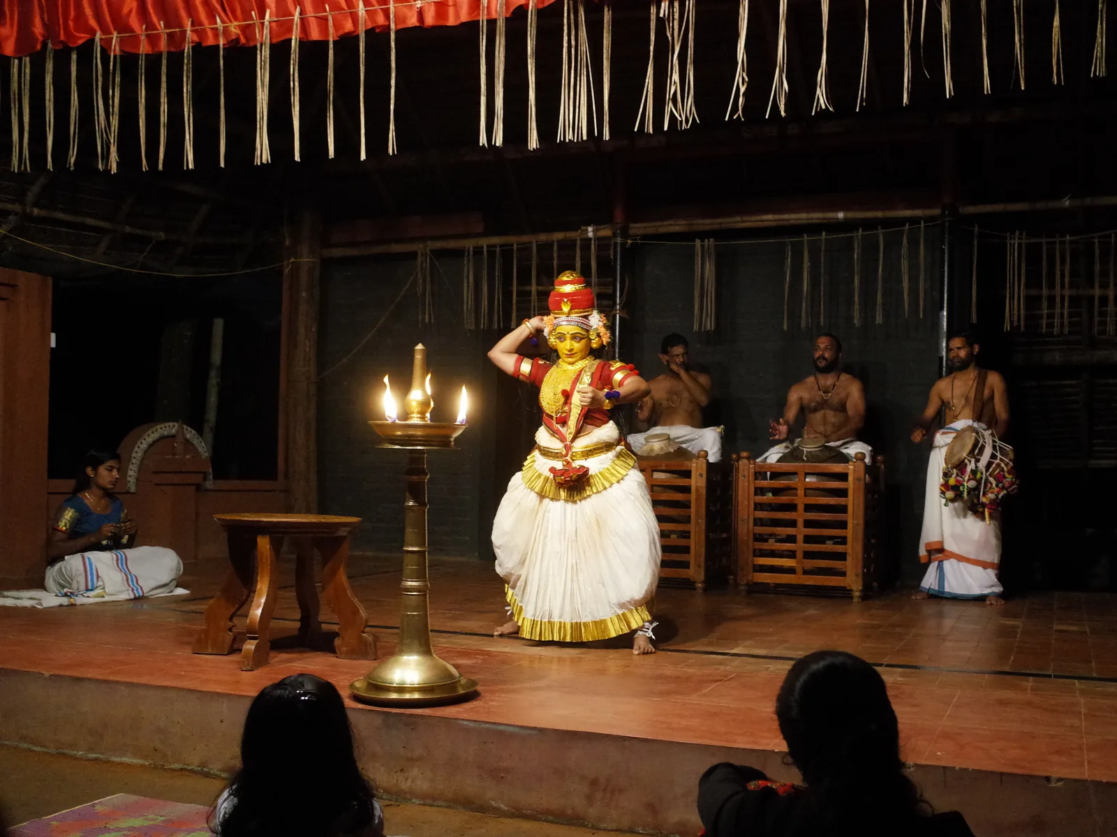 Kutiyattam Sanskrit Theatre performer with elaborate traditional makeup and costume performing in a Kerala temple kuttambalam — Kutiyattam (File 00010) was India's first UNESCO ICH inscription at the founding 3rd session in 2008, recognized as one of the world's oldest surviving theatre traditions documented from the 10th century CE