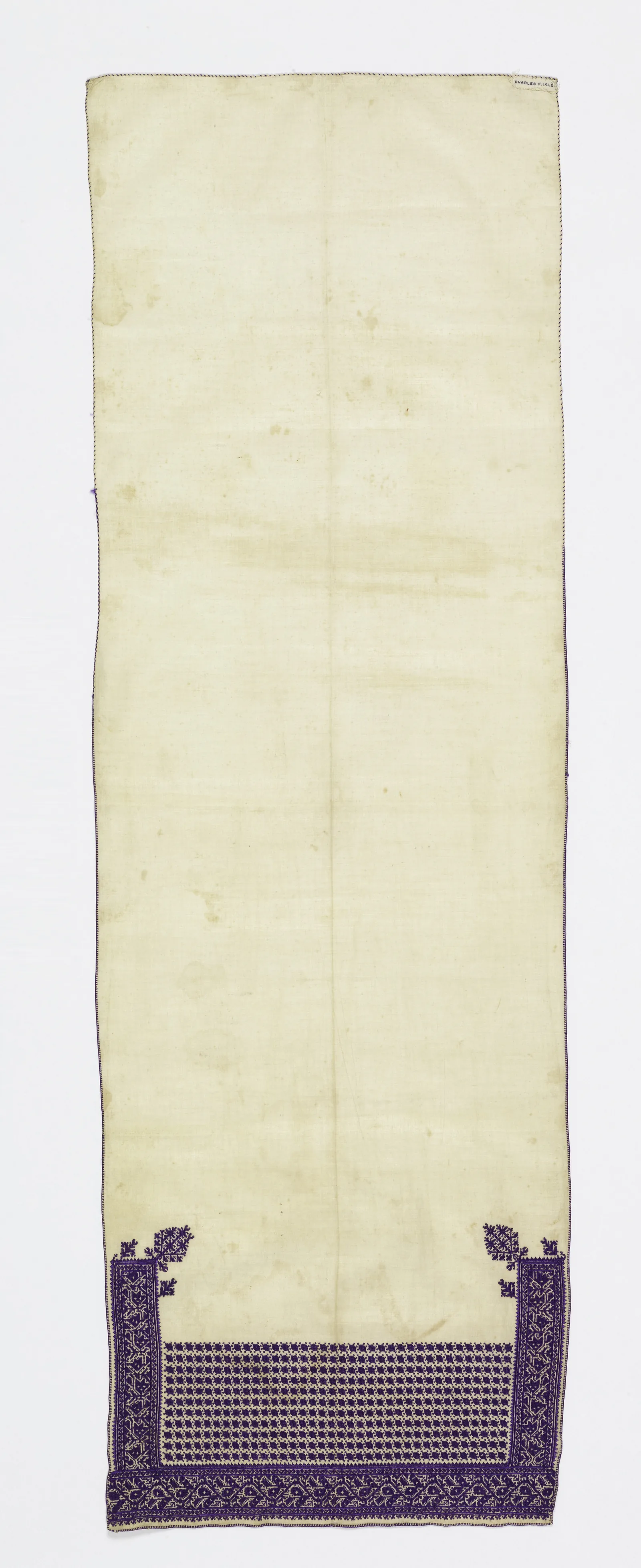 19th-century Moroccan embroidery panel — geometric blue-thread border on linen, Cooper Hewitt Museum collection — representing the regional embroidery traditions (Tetouan taajira, Fez ntaa, Rabat tarz rbati, Azemmour tarz azemmouri) recognized in UNESCO's 2025 inscription of the Moroccan Caftan as intangible cultural heritage (File 02077)