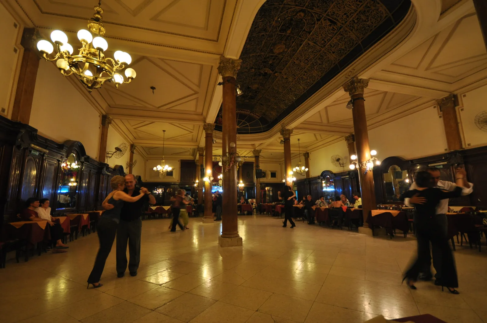 Couples dancing tango at a milonga at the Confitería Ideal in Buenos Aires (2010) — the milonga social dance event is the primary transmission environment recognized in UNESCO's 2009 inscription of tango as intangible cultural heritage File 00258