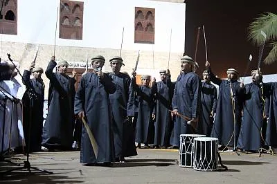 Al ‘azi, elegy, processional march and poetry